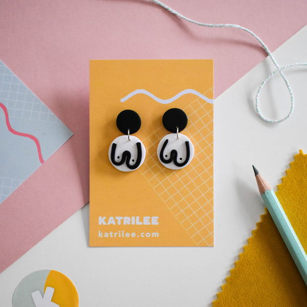 The Mammarlee Boob Dangle Earrings - Black and White - Katrilee
